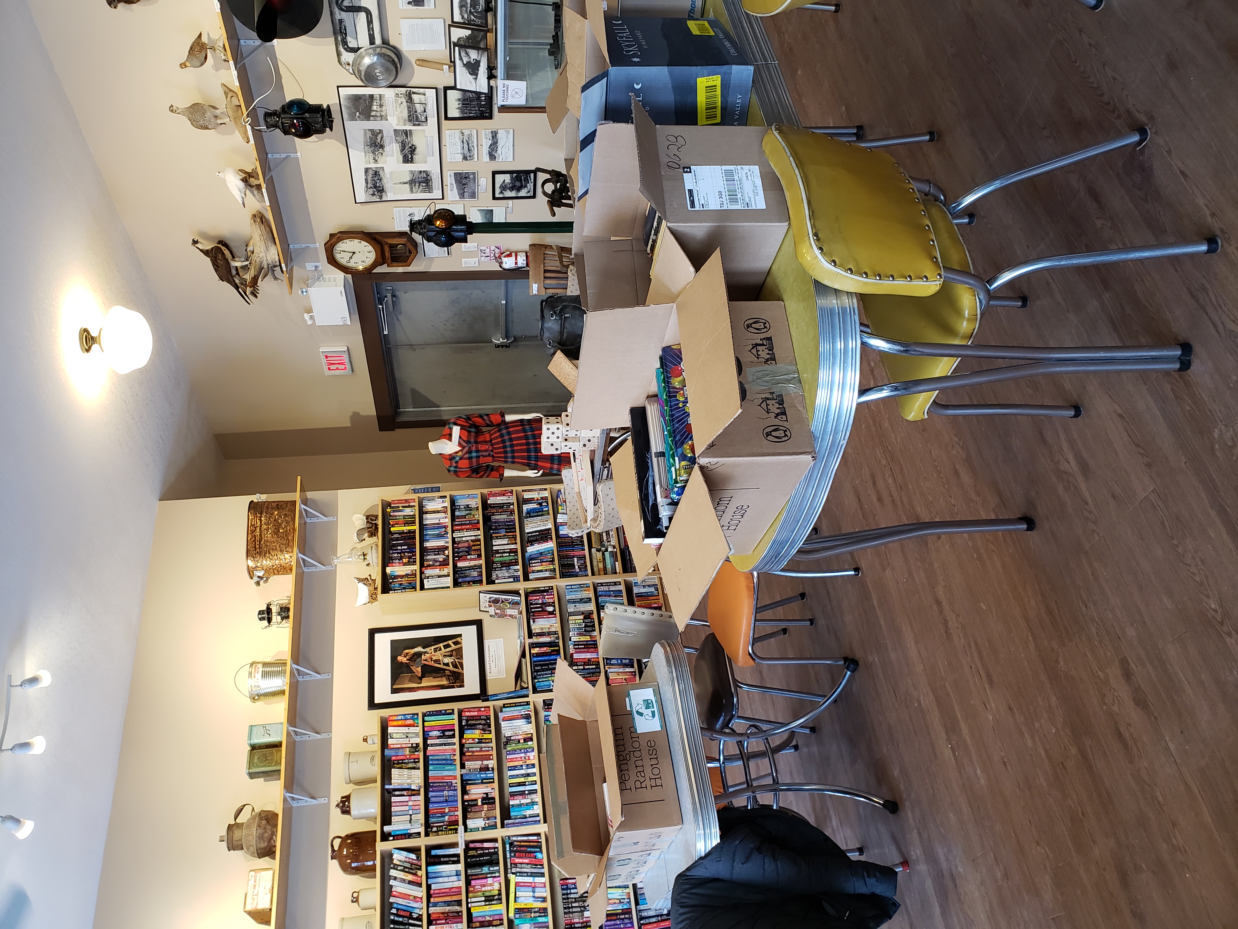 Rosebud Paperback library nook showing 5 ookcase full and little children's nook