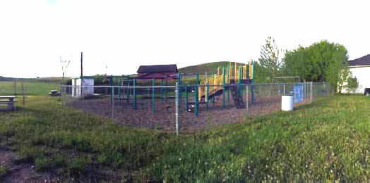 Playground with slide, swings, climbing equipment